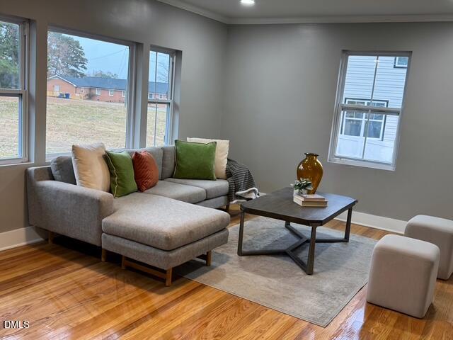 1005 East Hanover Road Graham, NC 27253 - Photo 6 of 8 a living room with furniture and a window