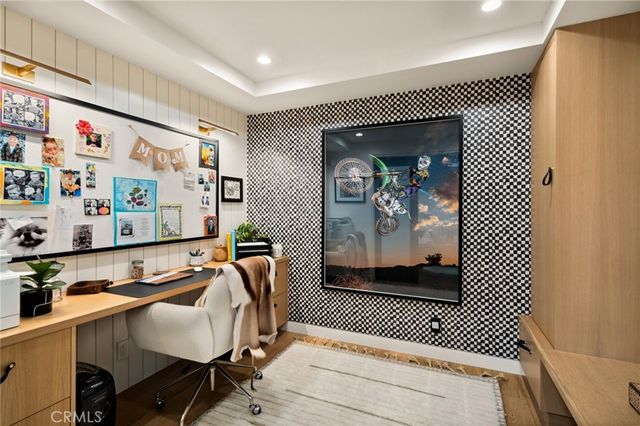 a view of swimming pool with furniture