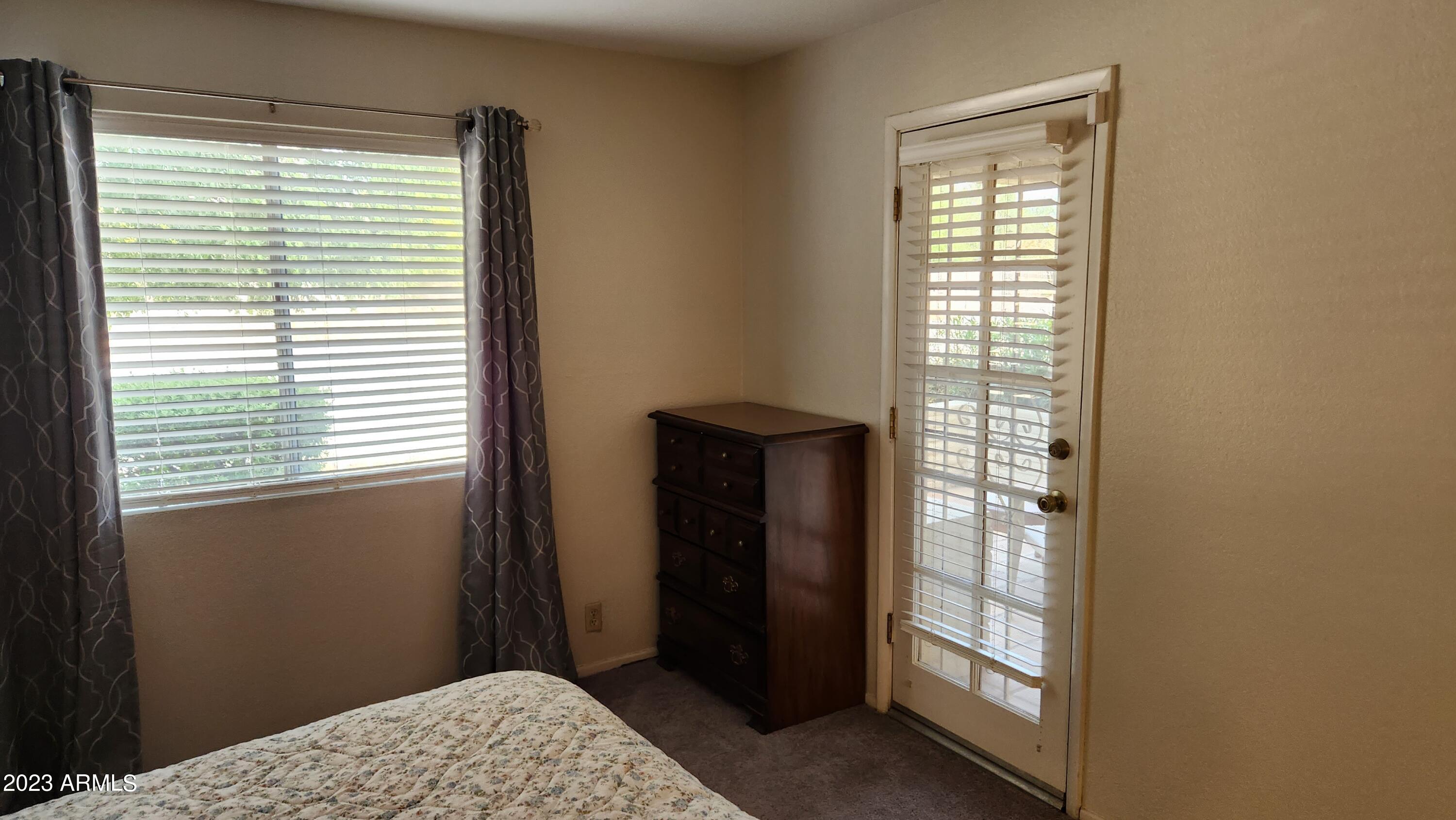 4150 East Cactus Road, Unit 101 Phoenix, AZ 85032 - Photo 11 of 27 DOOR TO THE PATIO