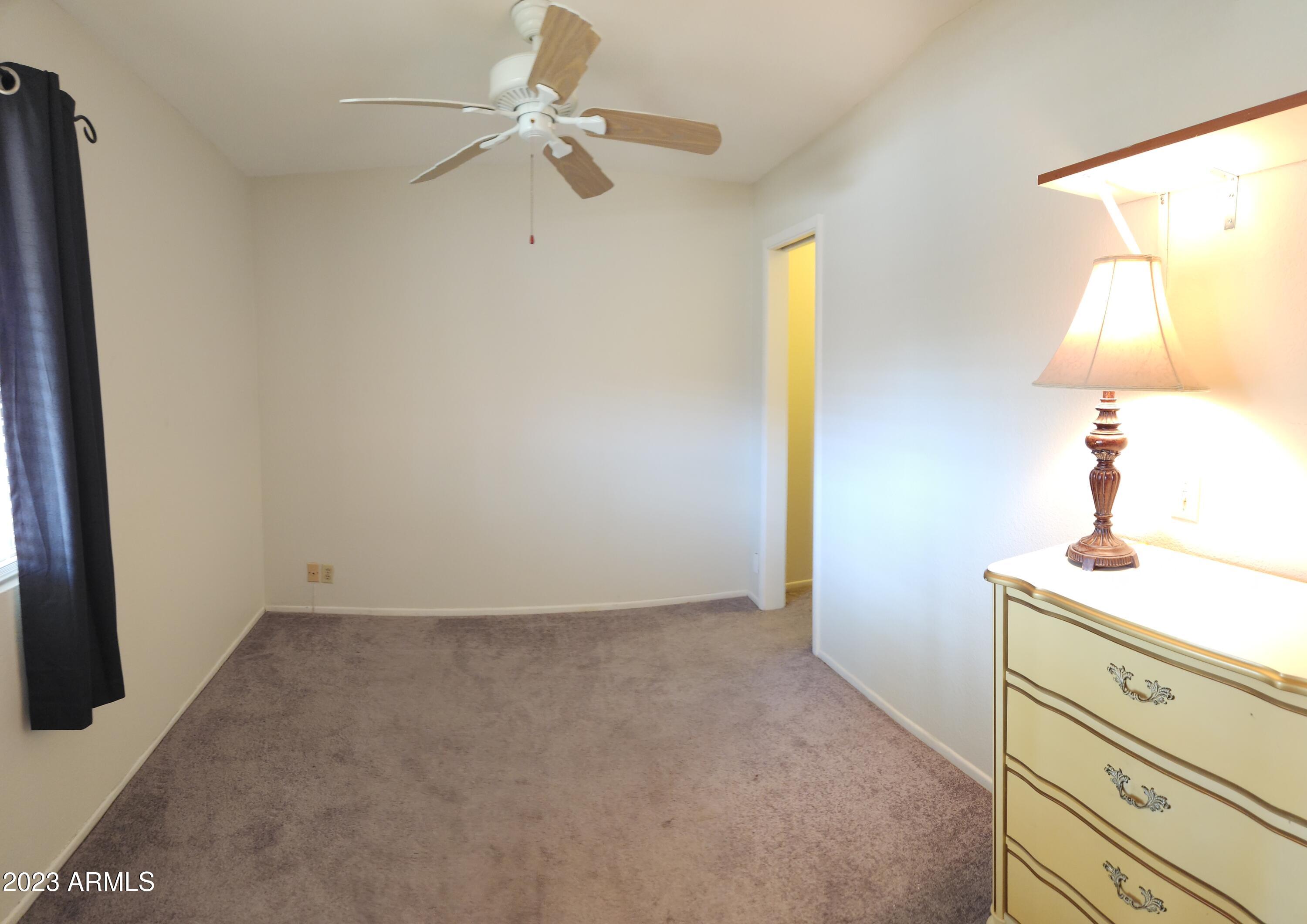 4150 East Cactus Road, Unit 101 Phoenix, AZ 85032 - Photo 14 of 27 SECOND BEDROOM