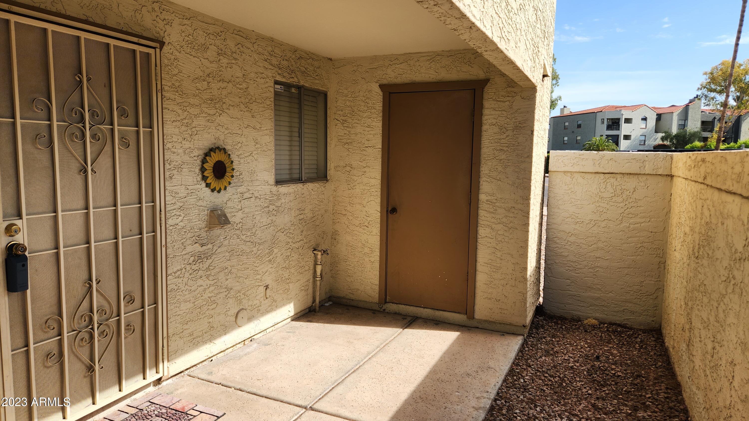 4150 East Cactus Road, Unit 101 Phoenix, AZ 85032 - Photo 18 of 27 FRONT PATIO