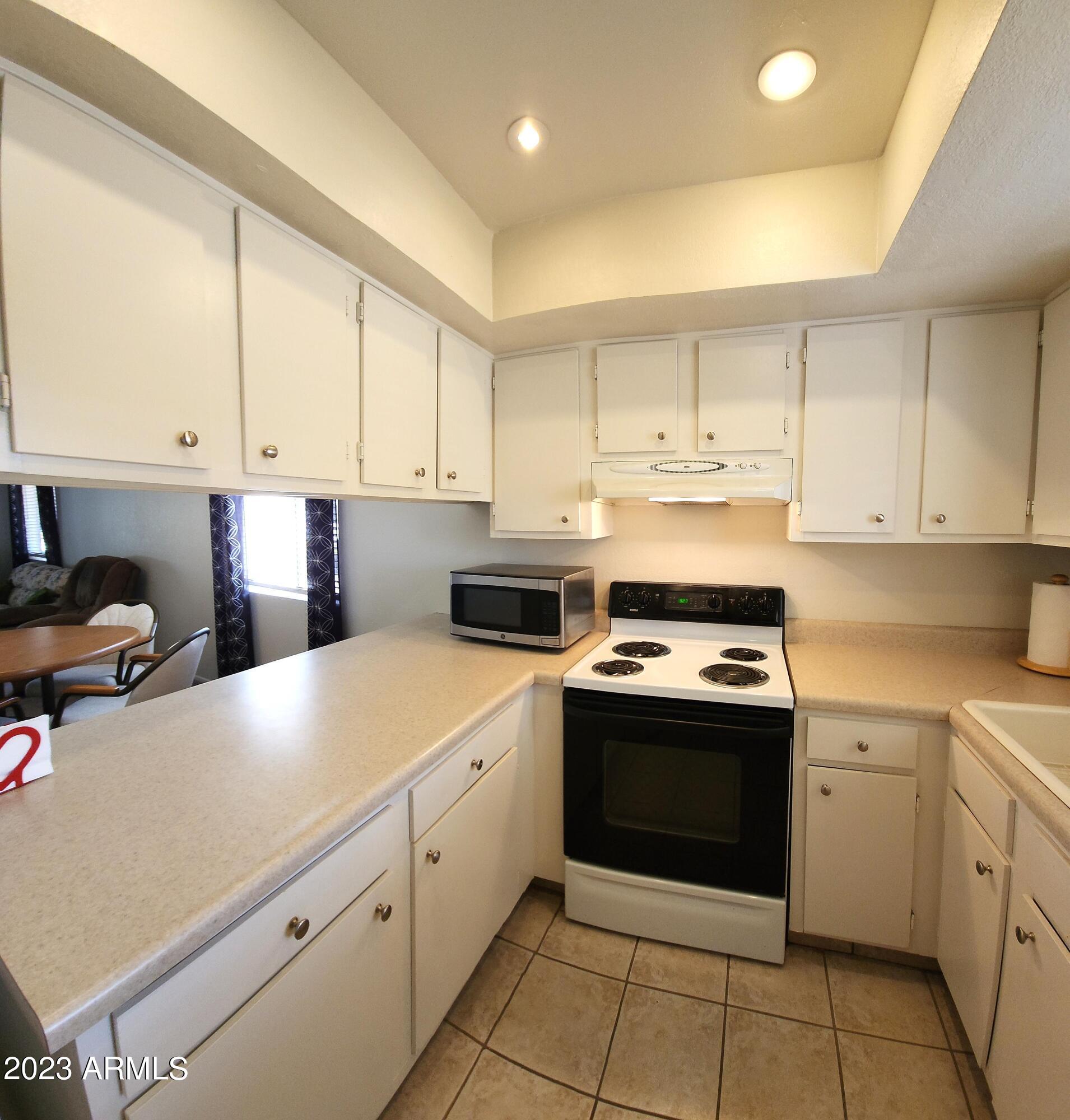 4150 East Cactus Road, Unit 101 Phoenix, AZ 85032 - Photo 4 of 27 KITCHEN