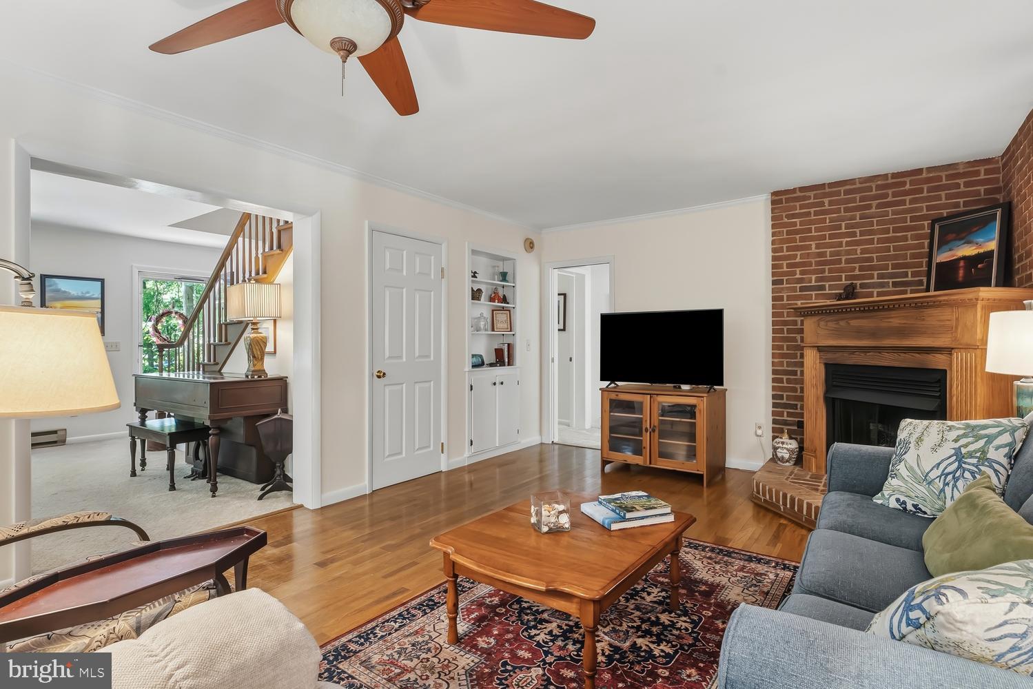 814 Wrights Neck Road Centreville, MD 21617 - Photo 33 of 53 a living room with fireplace furniture and a flat screen tv
