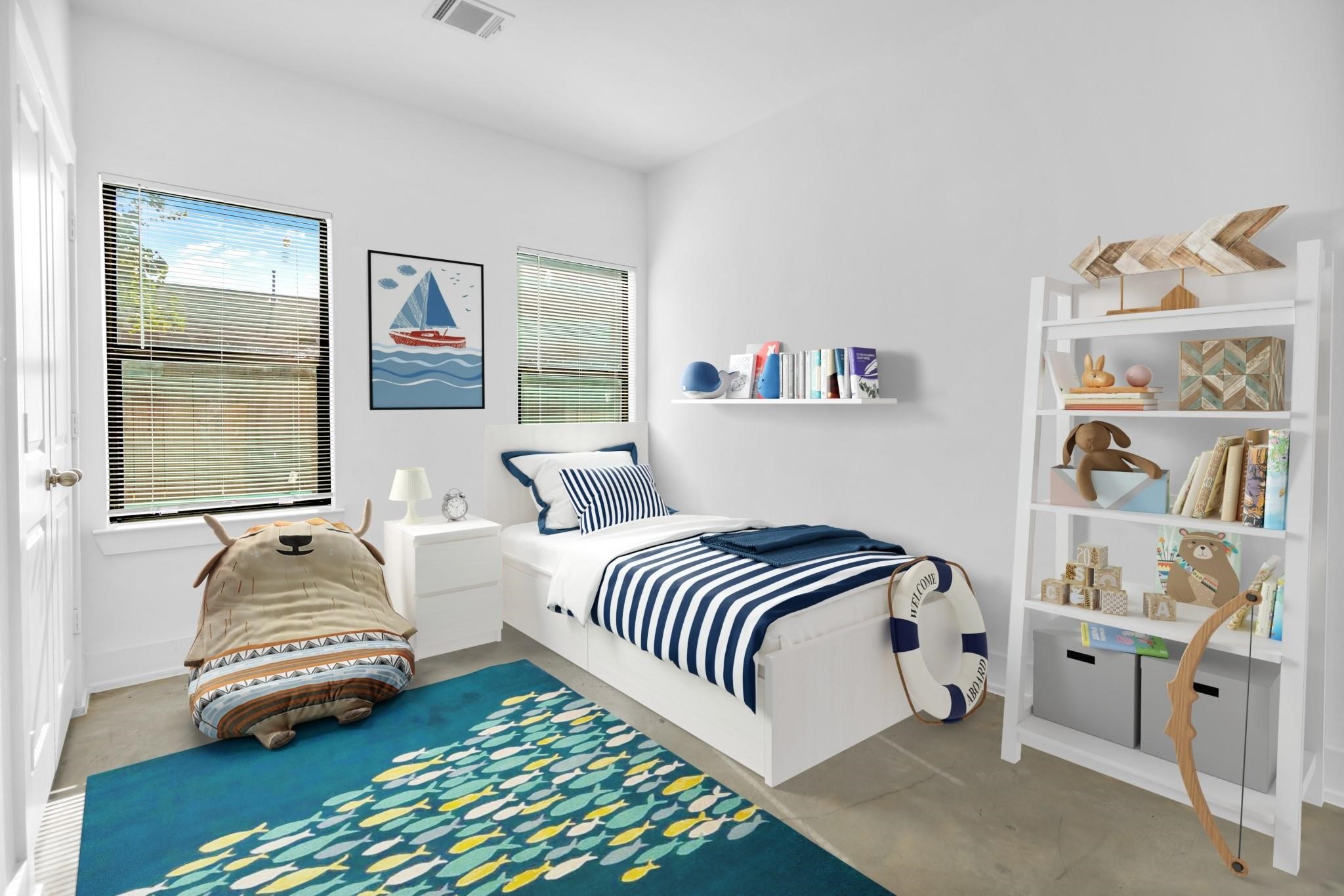 603 Edgewood Street, Unit B Houston, TX 77023 - Photo 12 of 16 Bright, expansive secondary bedrooms feature soaring walls and large windows for a fresh, airy feel.