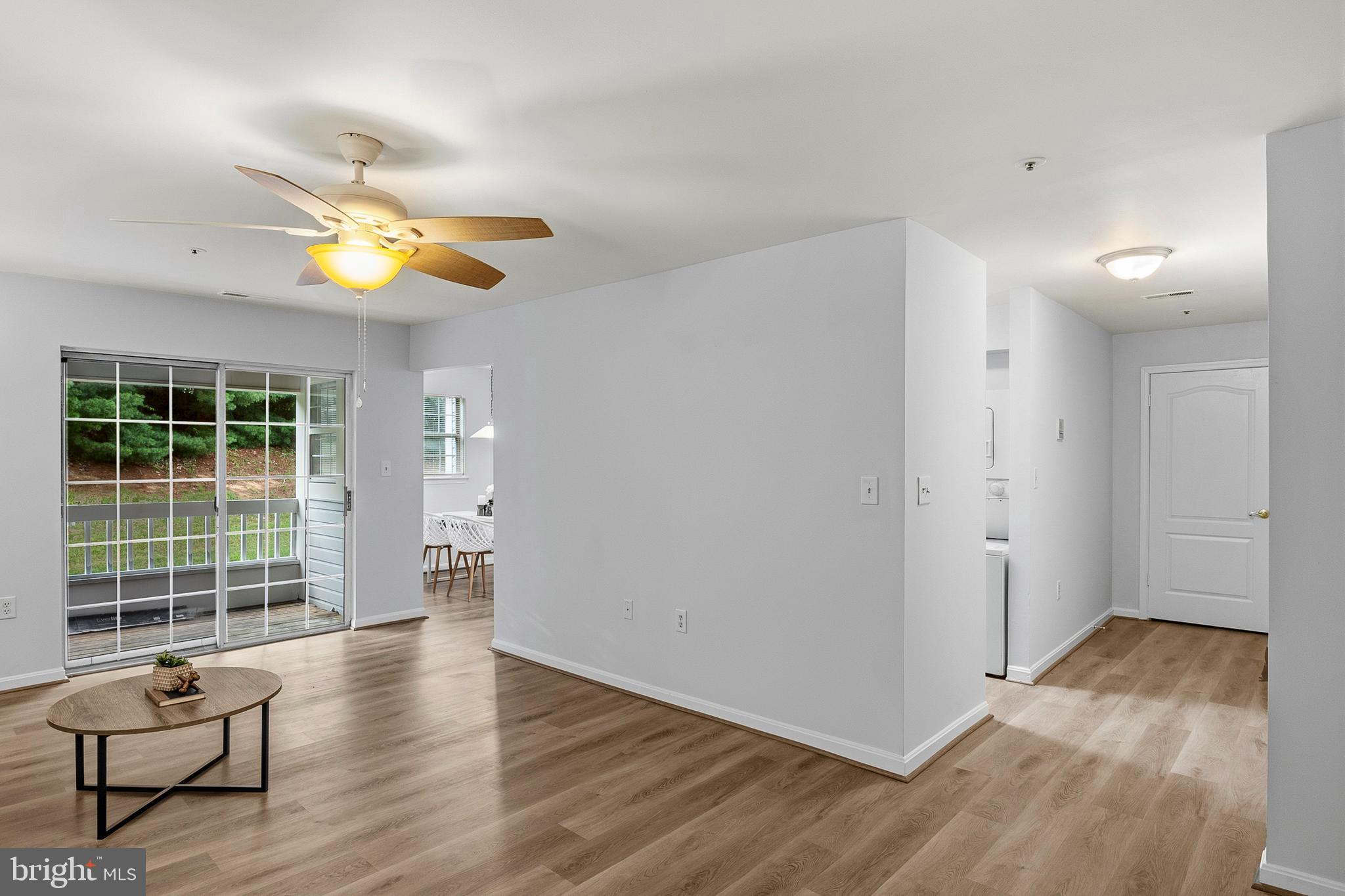 8390 Montgomery Run Road, Unit E Ellicott City, MD 21043 - Photo 2 of 26 Foyer Hallway and Living Room