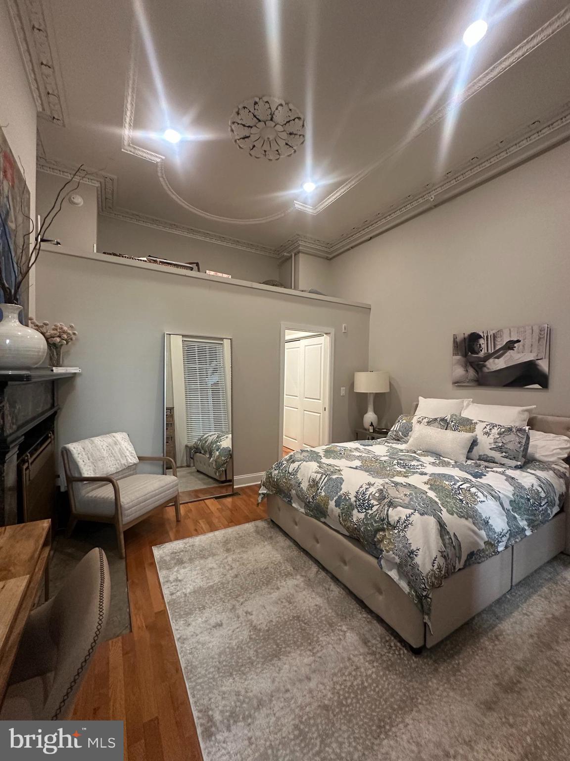 1015 Clinton Street, Unit 1F Philadelphia, PA 19107 - Photo 14 of 17 a bedroom with bed and window