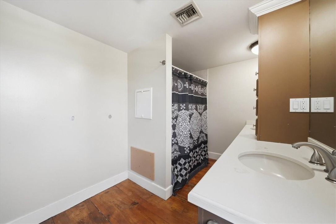 32 Equestrian Way Cranston, RI 02921 - Photo 23 of 50 Conveniently positioned between the flex room and rear bedroom, the bath helps create a connected upper-level suite arrangement.