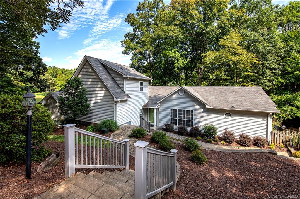 817 Bonum Road Lake Wylie, SC 29710 - Photo 1 of 41 a front view of a house with garden