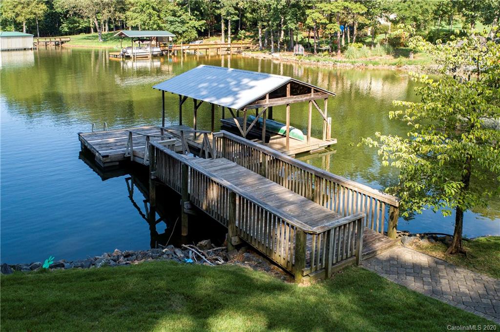 817 Bonum Road Lake Wylie, SC 29710 - Photo 14 of 41 a view of a house with pool and lake view