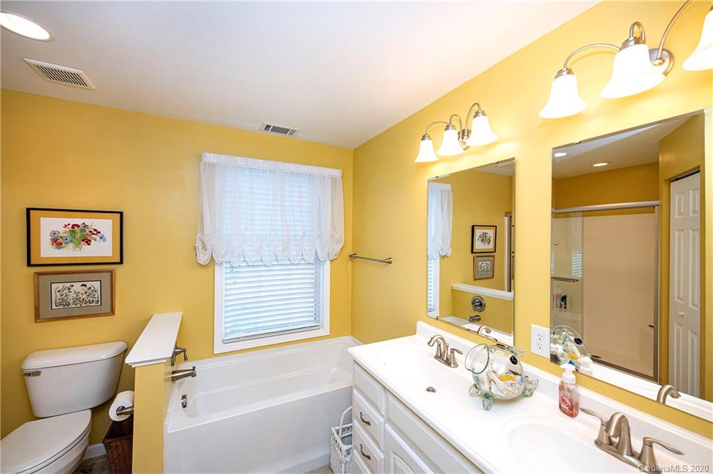 817 Bonum Road Lake Wylie, SC 29710 - Photo 27 of 41 a bathroom with a sink and a mirror