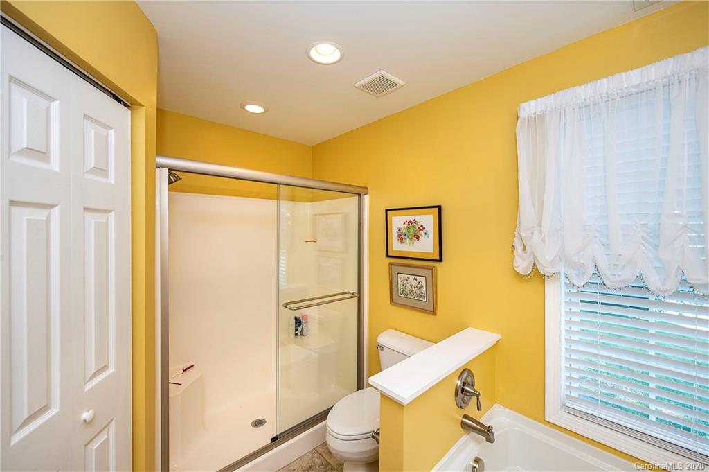 817 Bonum Road Lake Wylie, SC 29710 - Photo 28 of 41 a bathroom with a sink mirror toilet and shower