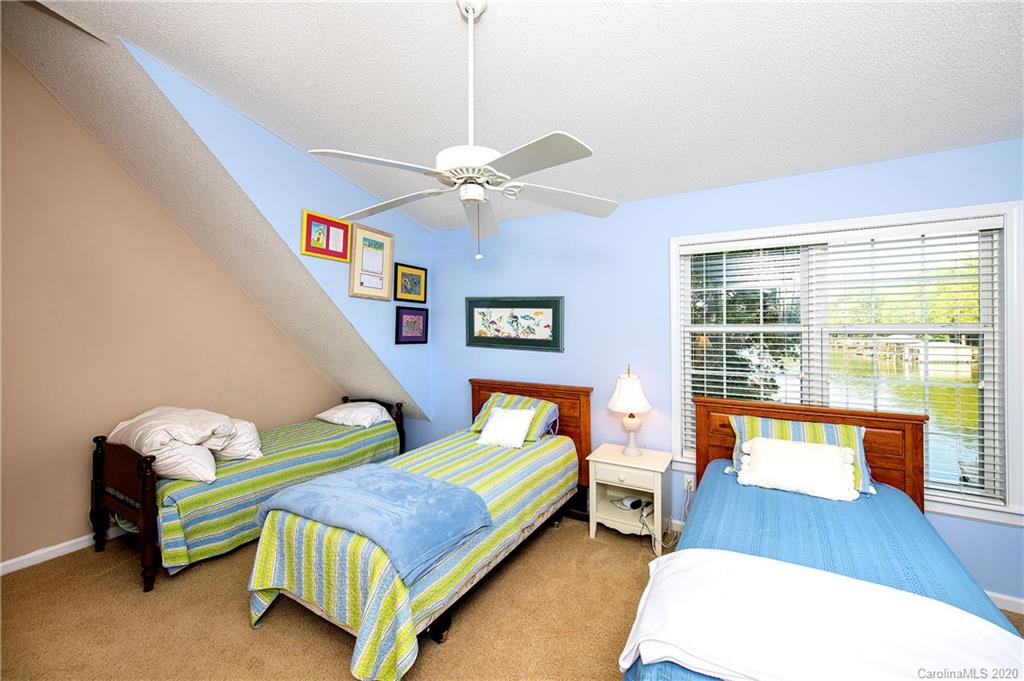 817 Bonum Road Lake Wylie, SC 29710 - Photo 31 of 41 a bedroom with 2 bed and a window