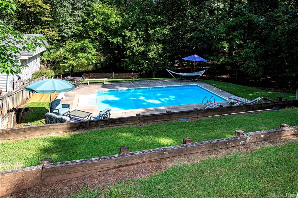 817 Bonum Road Lake Wylie, SC 29710 - Photo 40 of 41 a view of a swimming pool and lounge chairs in back yard