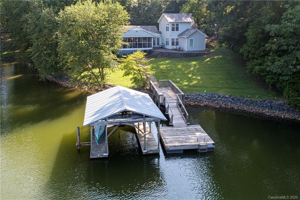 817 Bonum Road Lake Wylie, SC 29710 - Photo 10 of 41 an aerial view of a house with swimming pool and a yard