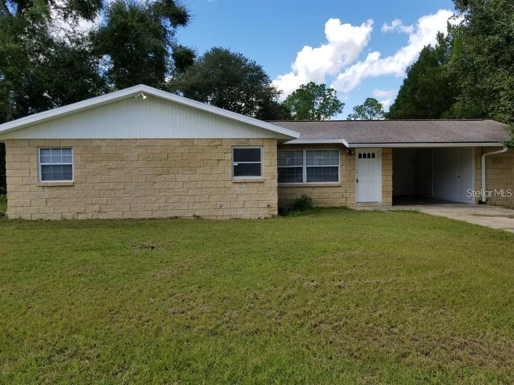 464 Lake Road Ocala, FL 34472 - Photo 1 of 1 a view of a house with a yard