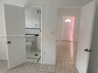 1537 Southwest 1st Street, Unit 2 Miami, FL 33135 - Photo 7 of 10 a bathroom with a shower