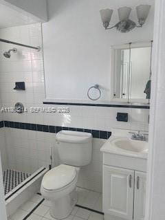 1537 Southwest 1st Street, Unit 2 Miami, FL 33135 - Photo 10 of 10 a bathroom with a sink a toilet and mirror