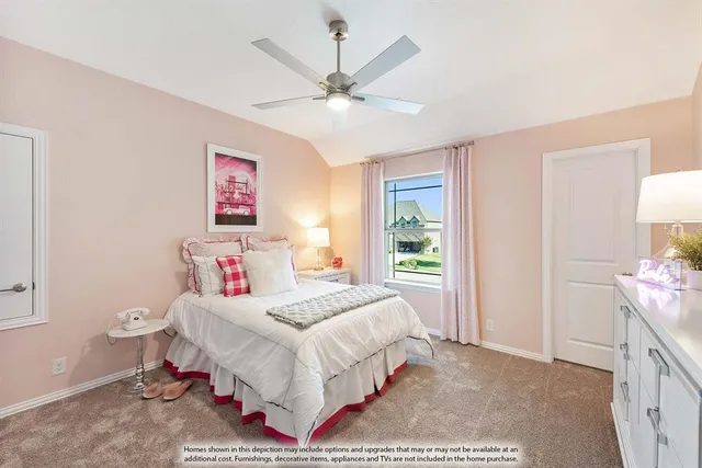 a bedroom with a bed chandelier and a window