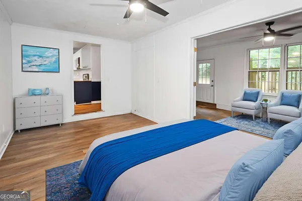 a bedroom with a bed and furniture