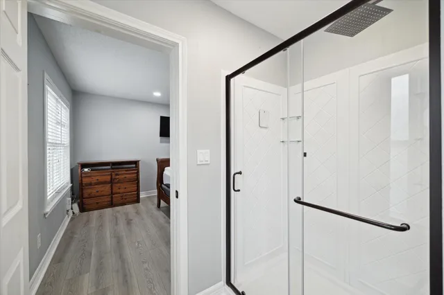 a room with closet and wooden floor