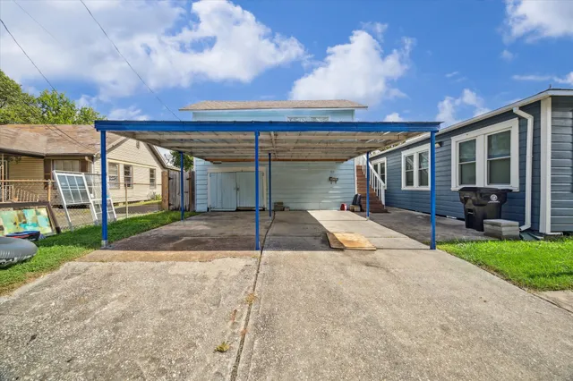 a house with yard in front of it