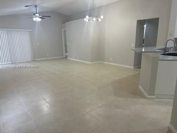 an empty room with a bathroom