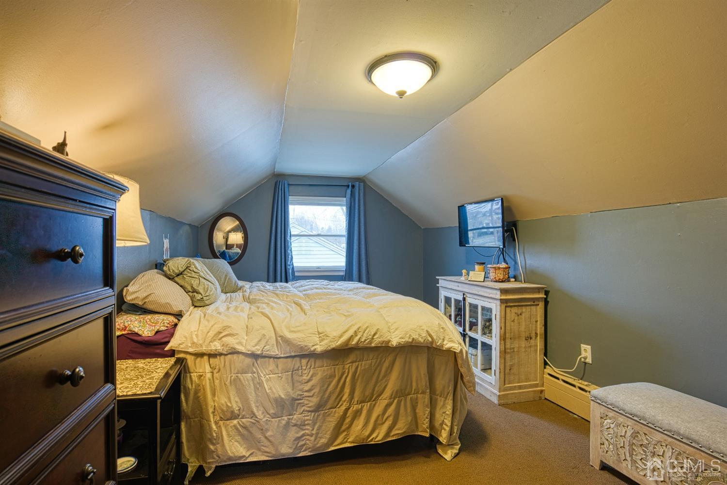 8 Clausen Road Edison, NJ 08817 - Photo 11 of 17 a bedroom with a bed and window