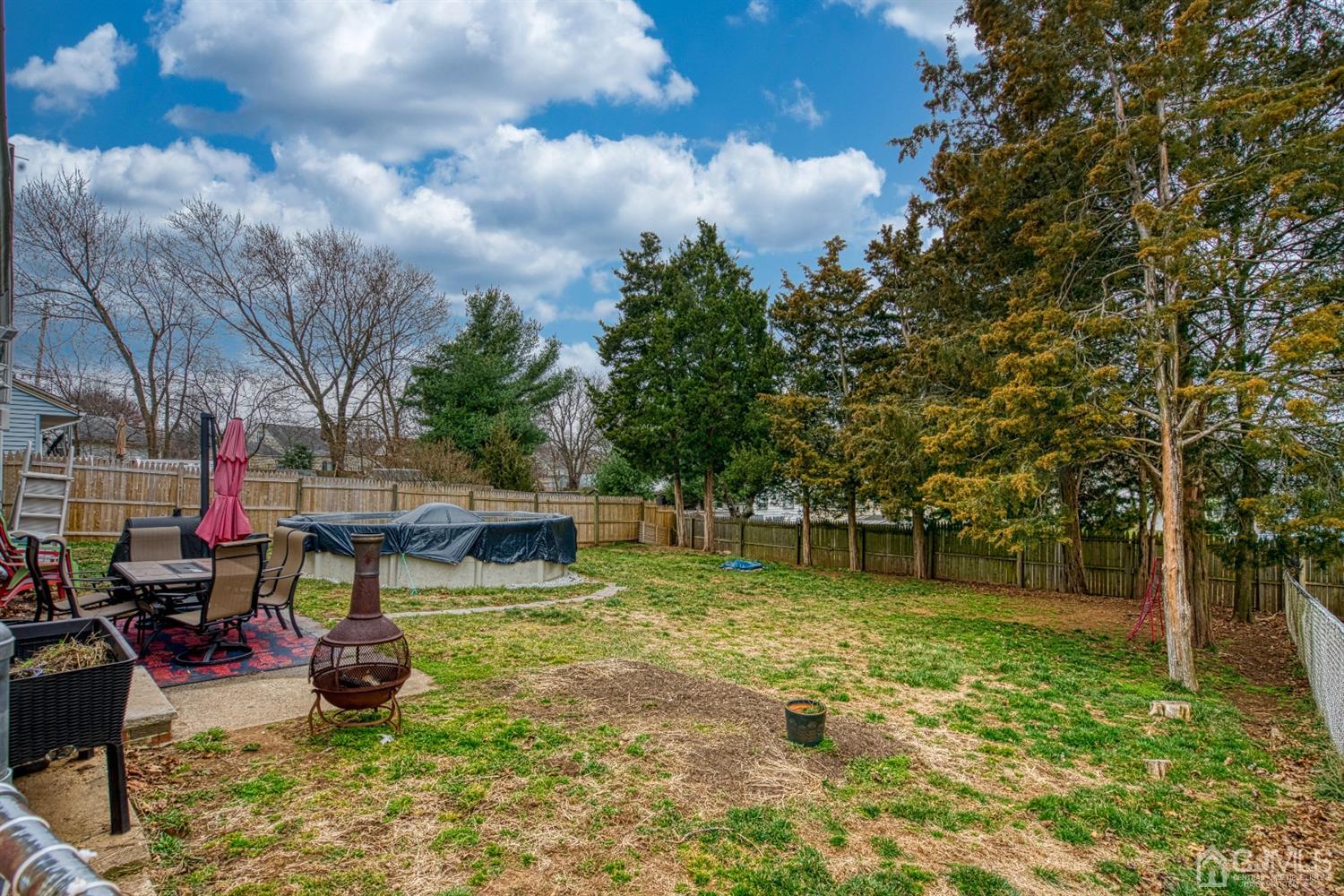 8 Clausen Road Edison, NJ 08817 - Photo 17 of 17 a view of a garden with swimming pool