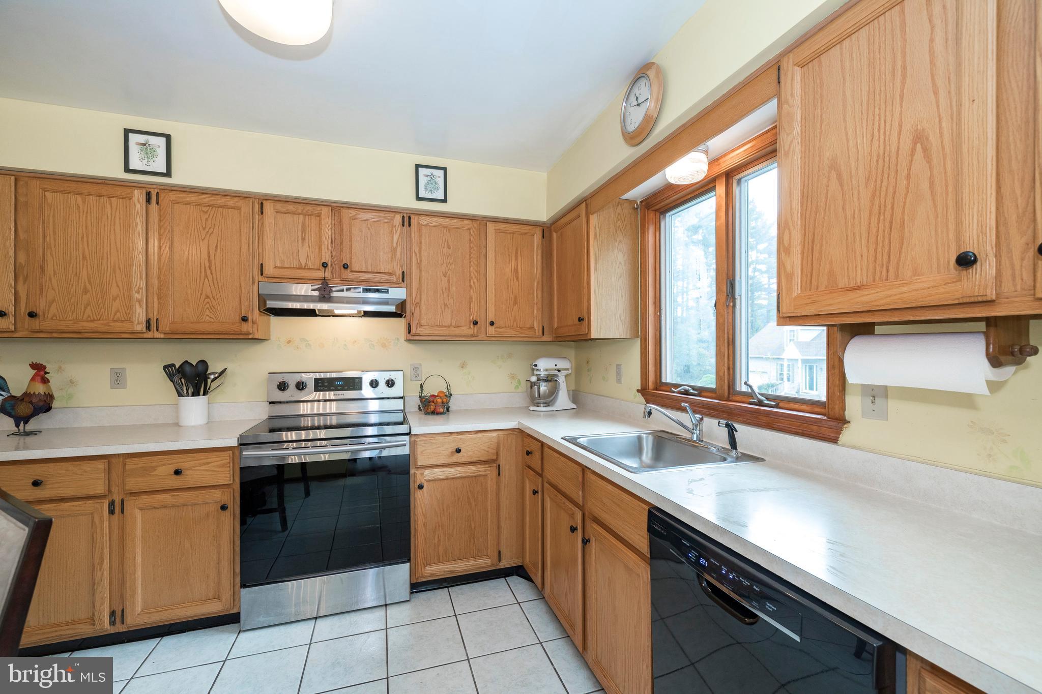 120 Culbertson Run Road Downingtown, PA 19335 - Photo 8 of 36 Cheerful Eat-In Kitchen with Custom Tile Floor!