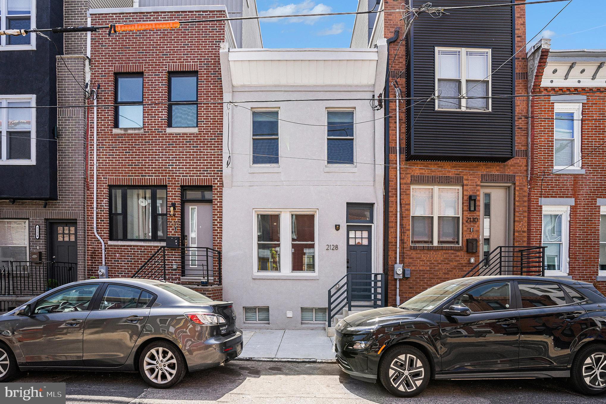 a view of a car parked in front of a building