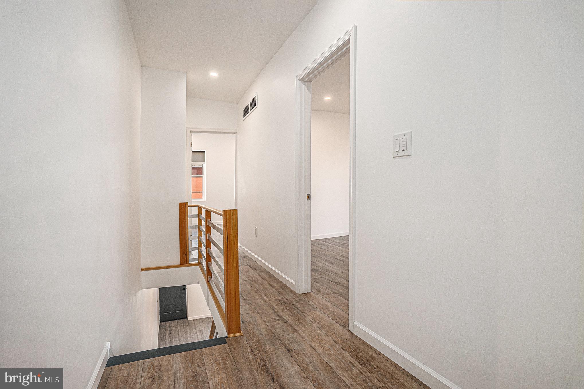 2128 Fernon Street Philadelphia, PA 19145 - Photo 14 of 30 a view of entryway with wooden floor