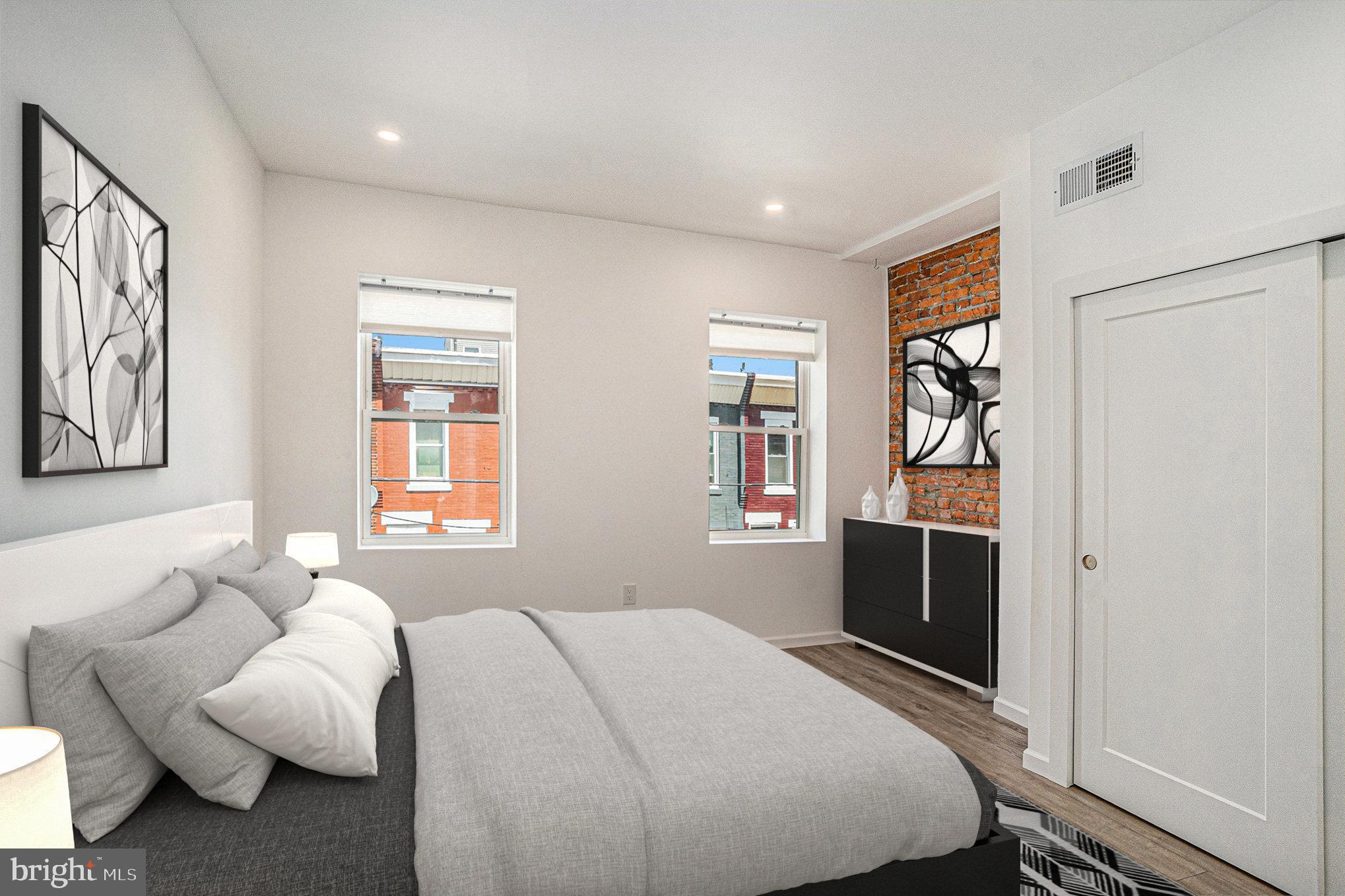 2128 Fernon Street Philadelphia, PA 19145 - Photo 18 of 30 a bedroom with bed and a window