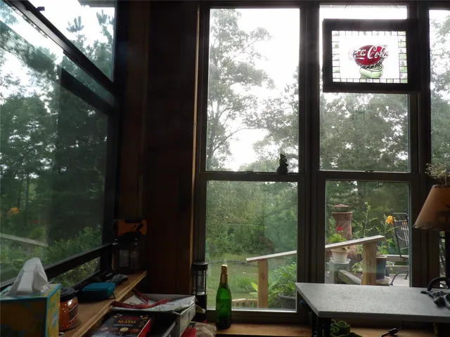 a view of balcony with furniture