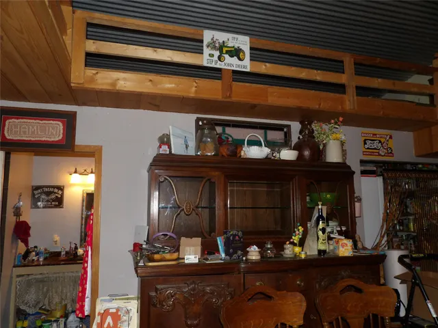 a room with lots of wooden furniture