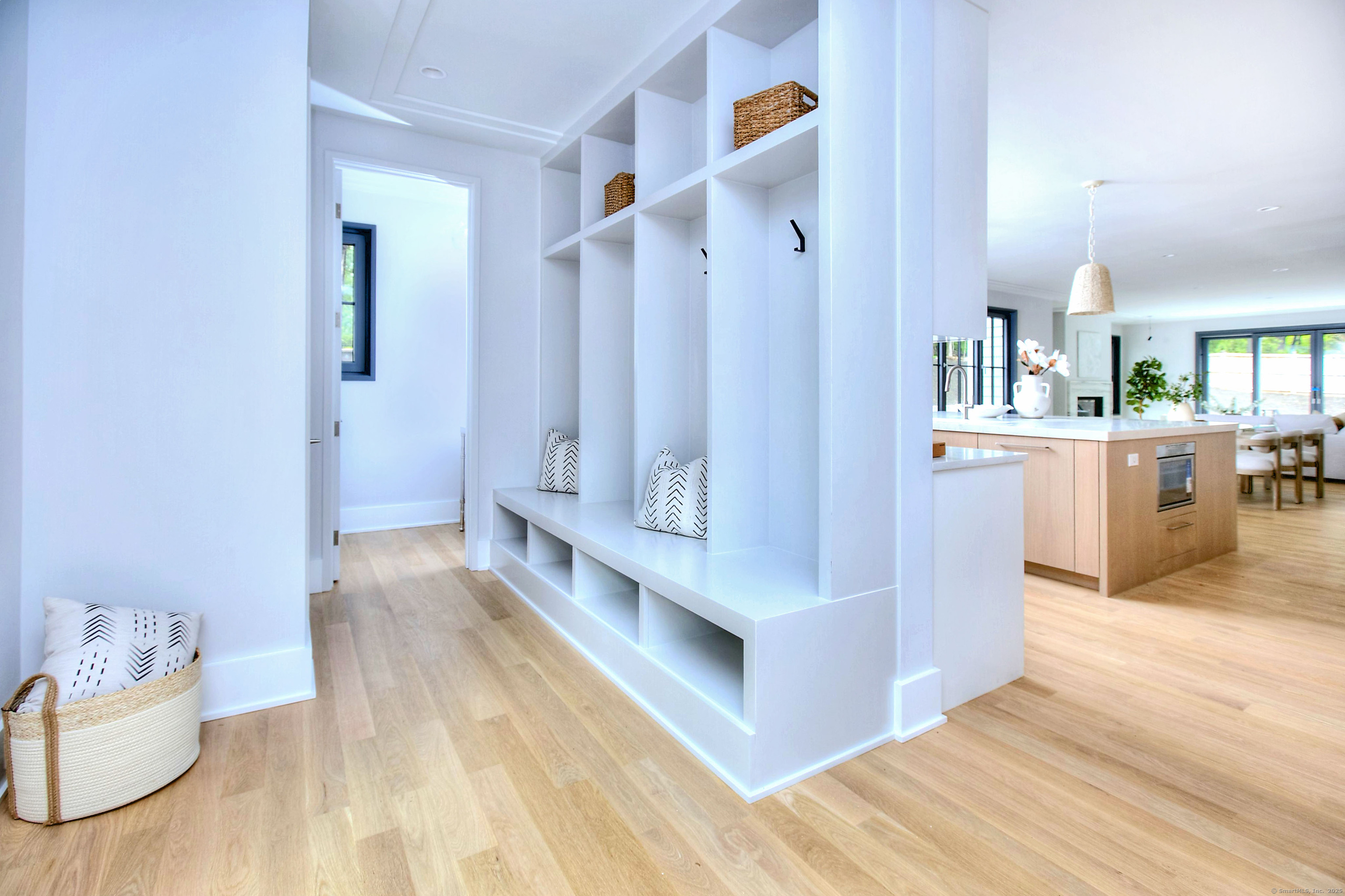 3 Hubbel's Lane Westport, CT 06880 - Photo 13 of 40 The obligatory mudroom and first floor powder room. Plus there's a door to the yard on this side of the house as well - easy access from everywhere.