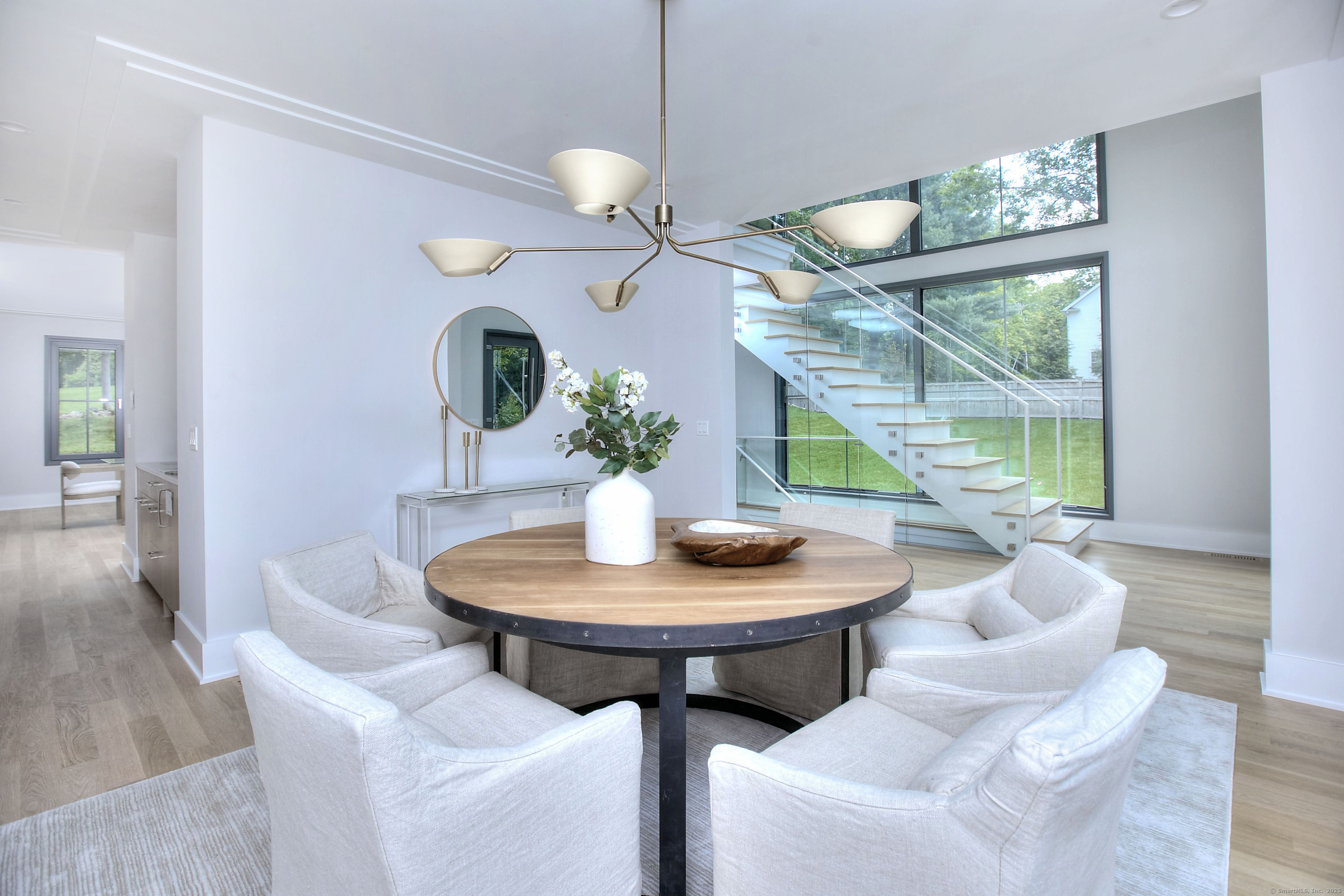 3 Hubbel's Lane Westport, CT 06880 - Photo 3 of 40 The dining room is at the front of the house next to the spectacular glass foyer area.