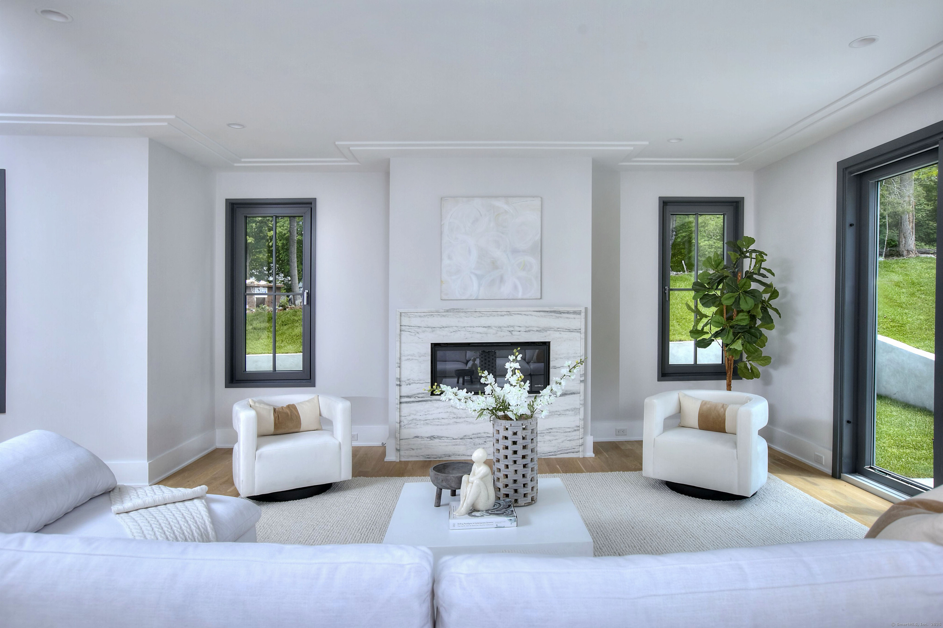 3 Hubbel's Lane Westport, CT 06880 - Photo 8 of 40 The family room - complete with a gas burning fireplace and sliders to the yard