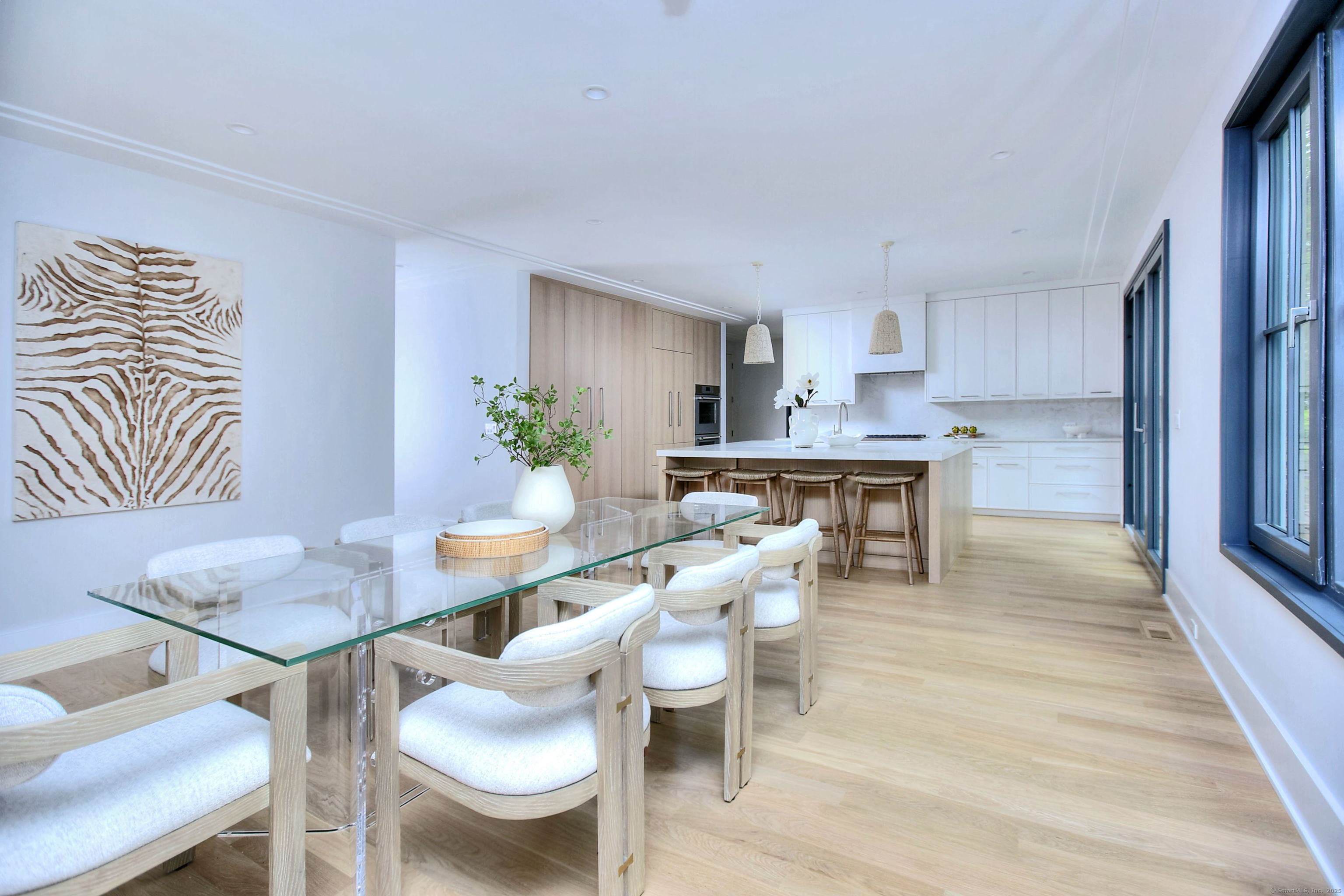 3 Hubbel's Lane Westport, CT 06880 - Photo 9 of 40 Check out the wall of wooden cabinetry and appliances - low key and chic.