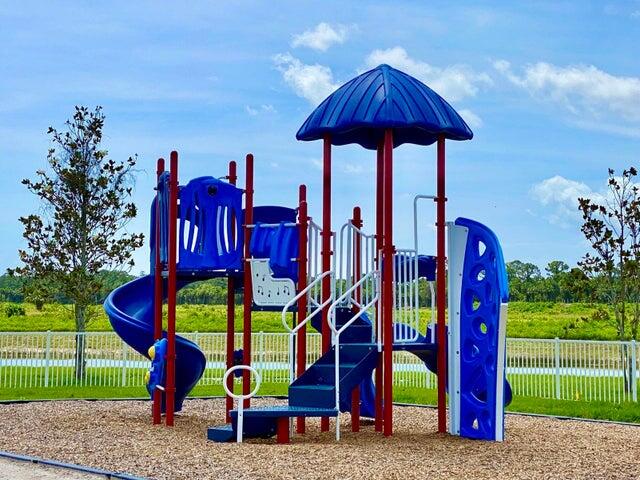 5117 Modeno Street Fort Pierce, FL 34951 - Photo 11 of 12 out side child play area