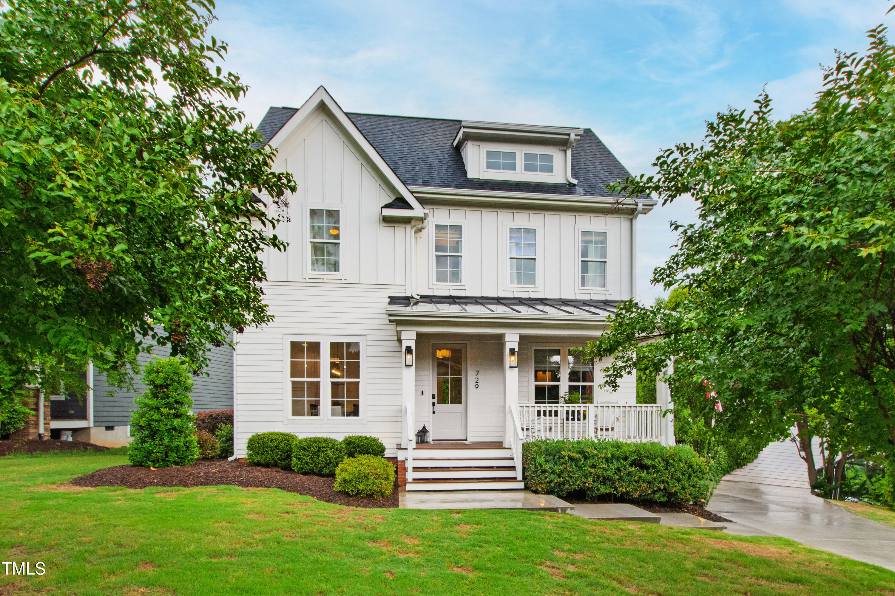 729 Mills Street Raleigh, NC 27608 - Photo 1 of 61 a front view of a house with a yard
