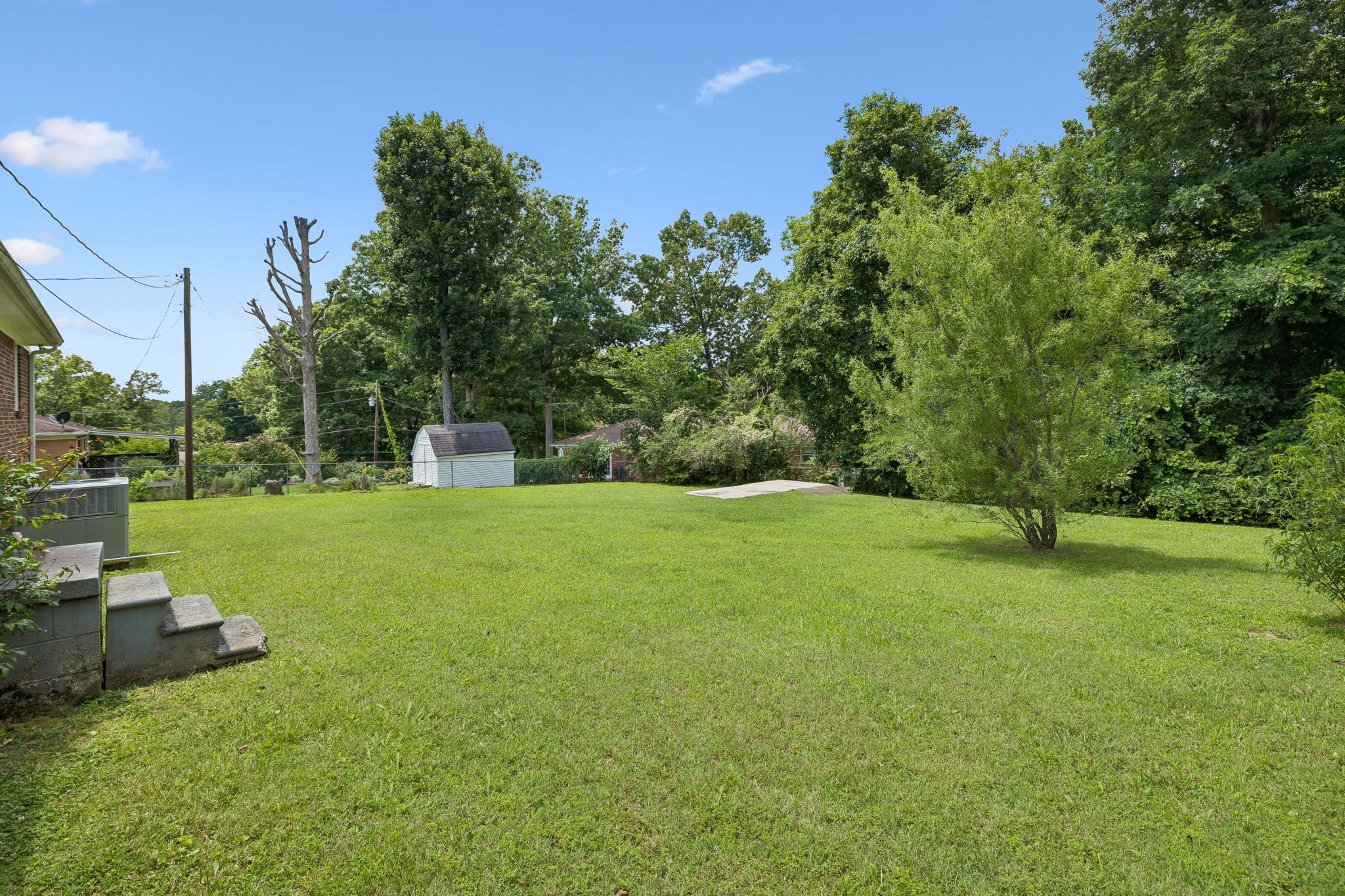 708 Hickory Street Centerville, TN 37033 - Photo 32 of 57 a view of a garden with a house