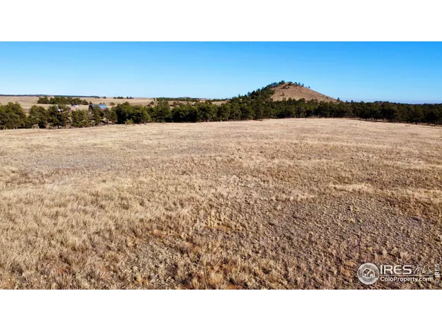 a view of outdoor space and a mountain view in back