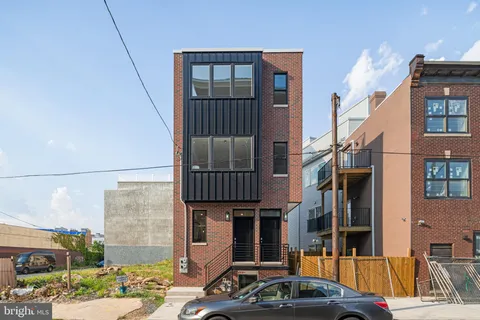 a car parked in front of a building