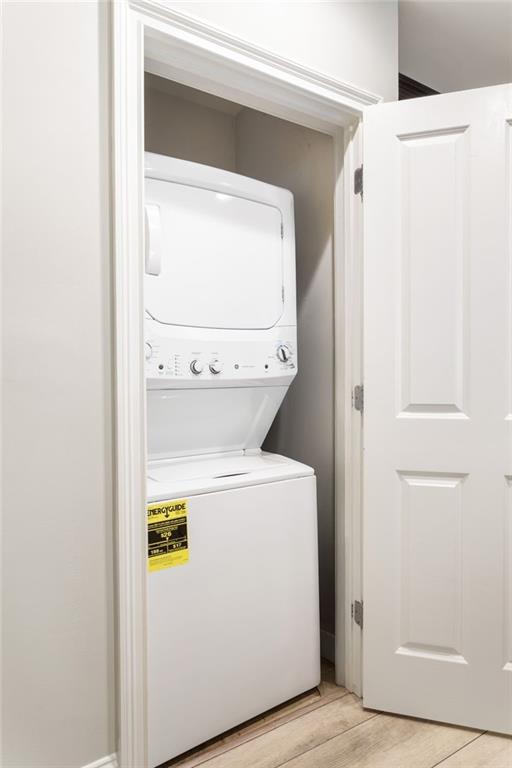 2255 Peachtree Road Northeast, Unit 326 Atlanta, GA 30309 - Photo 16 of 37 a utility room with dryer and washer
