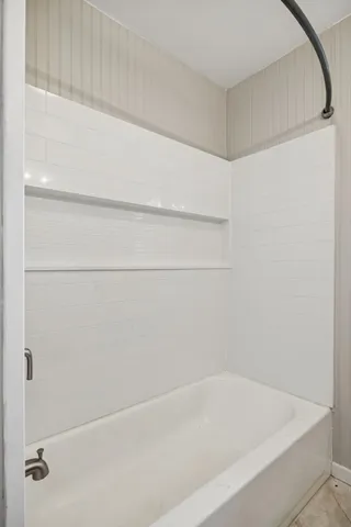 a bathroom with a bathtub