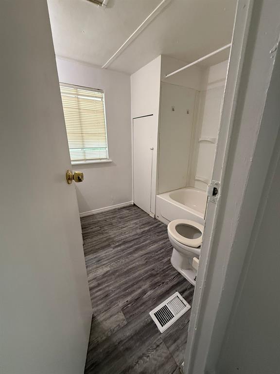 109 East Prospect Street Denison, TX 75021 - Photo 14 of 16 a bathroom with a sink and a mirror