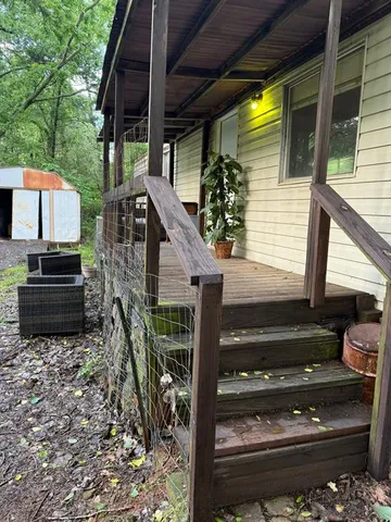 a backyard of a house with lots of green space