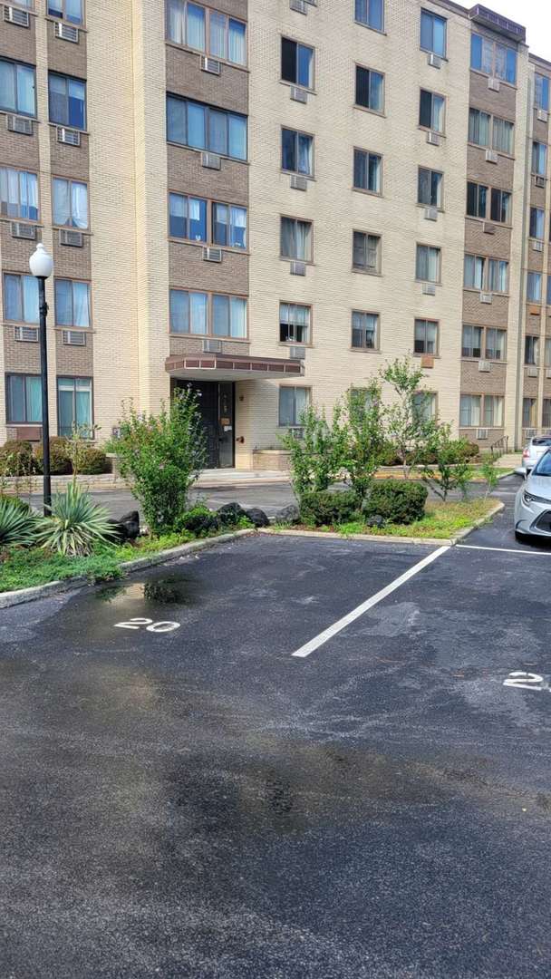 a view of a building with a street