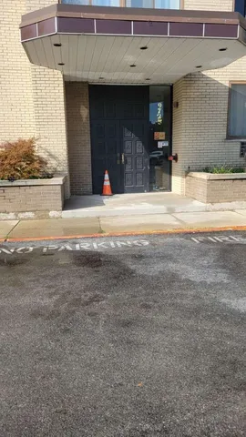 a view of a building with a street