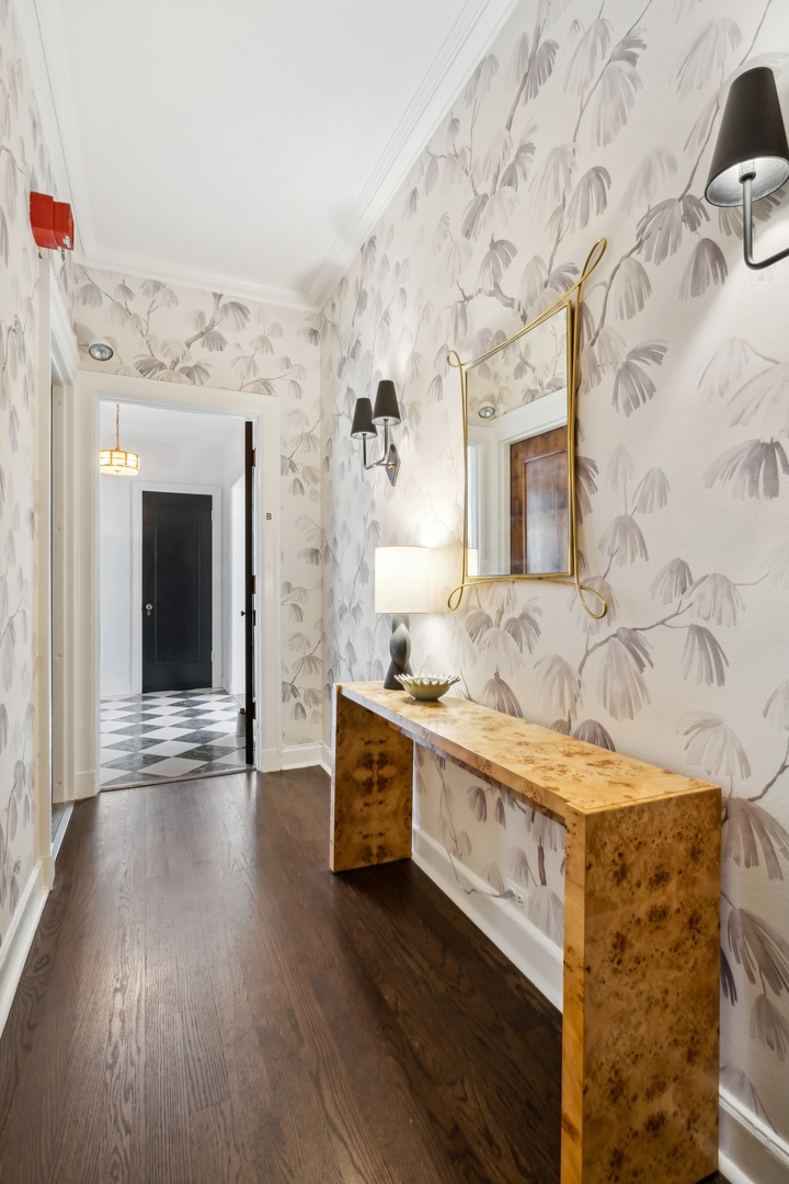 3100 North Sheridan Road, Unit 14B Chicago, IL 60657 - Photo 2 of 50 a spacious bathroom with a granite countertop sink and a mirror